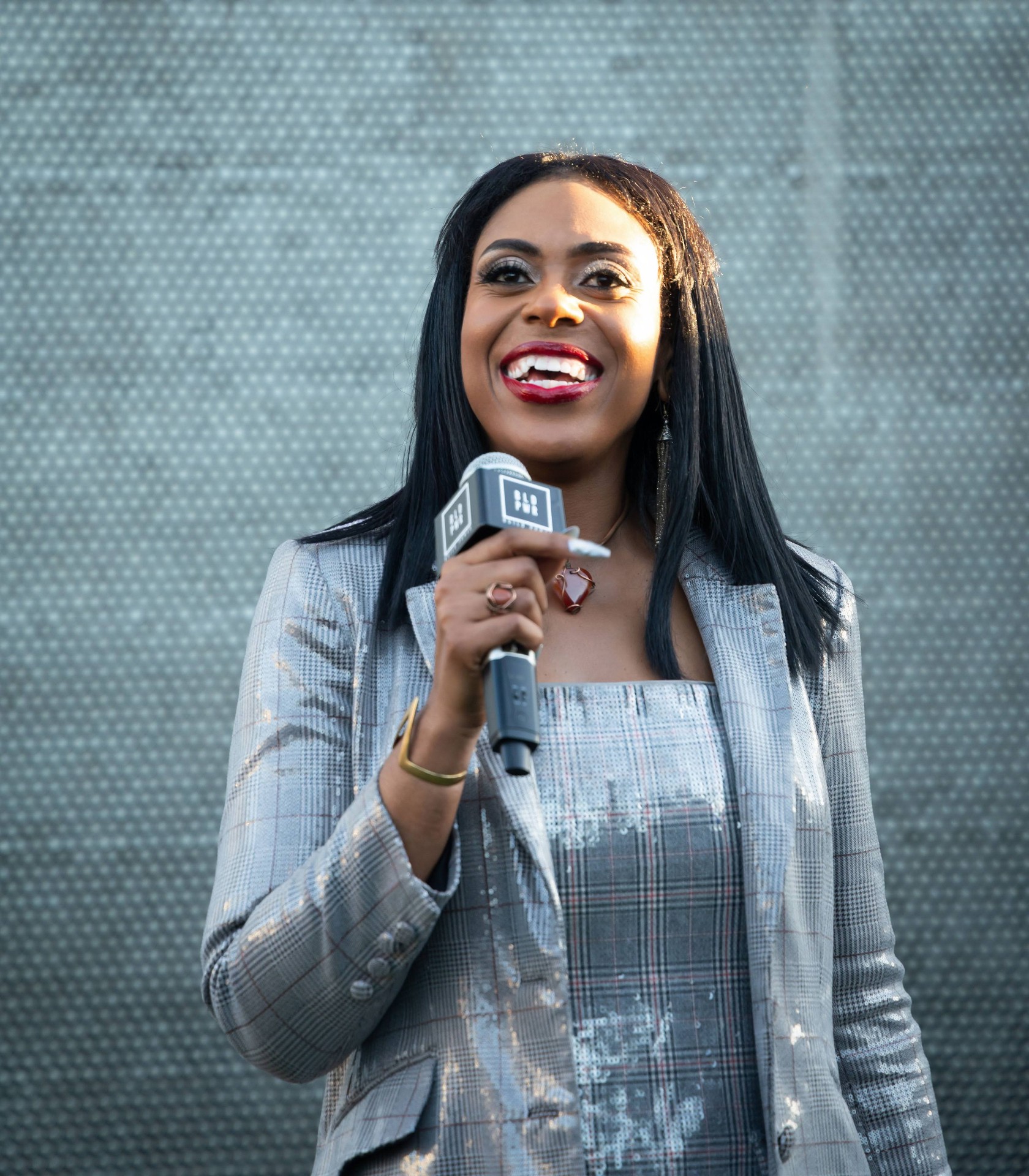 Christa speaking at an event